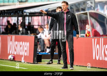 Leipzig, Germany. 25th Apr, 2021. Head coach Julian Nagelsmann of Leipzig reacts during a German Bundesliga match between RB Leipzig and VfB Stuttgart in Leipzig, Germany, April 25, 2021. Credit: Kevin Voigt/Xinhua/Alamy Live News Stock Photo