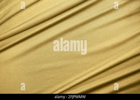 Luxurious golden fabric texture background Stock Photo