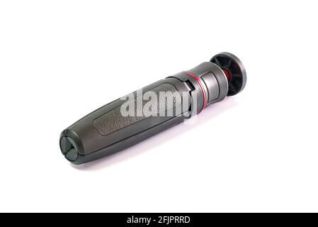 Black tripod mini with red ball head for smartphone camera isolated on white background Stock Photo