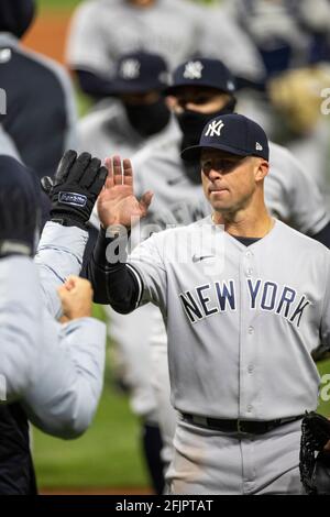 New York Yankees left fielder Brett Gardner (11) celebrates a win after an MLB regular season game against the Cleveland Indians, Thursday, April 22nd Stock Photo