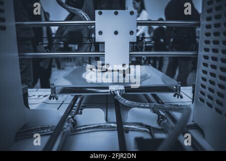The process of working 3D printer and creating a three-dimensional object Stock Photo