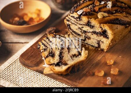 Traditional Polish vegan babka cake with chocolate on wooden background Stock Photo