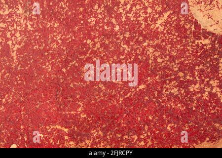 Red, worn cardboard texture background Stock Photo