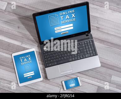 Online tax service concept shown on different information technology devices Stock Photo
