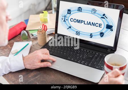Compliance concept shown on a laptop screen Stock Photo