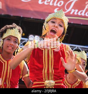 Female dancers and singers in traditional Indonesian costume perform at Hello Indonesia Festival, London Stock Photo