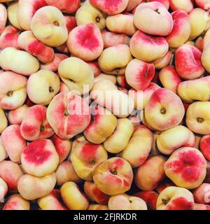 Food background red donut peach, fruit close up Stock Photo