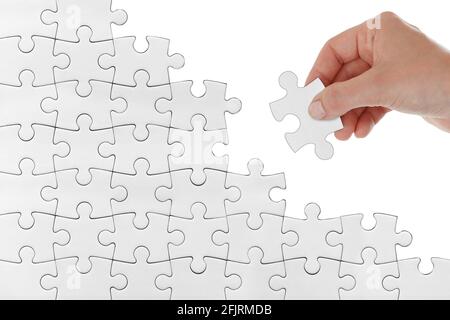White jigsaw puzzle pattern isolated Stock Photo