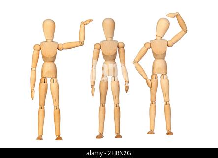 Many wooden mannequin doing differents gestures isolated on a white background Stock Photo