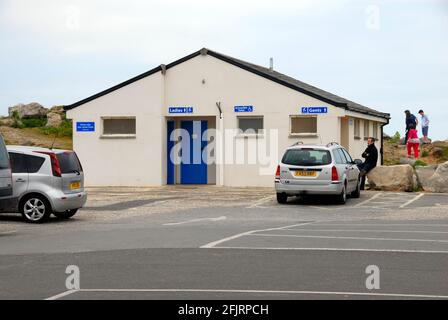 Modern public toilet in car park at holiday location Stock Photo