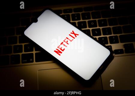 Greece. 26th Apr, 2021. In this photo illustration, a Netflix logo seen displayed on a smartphone screen with a computer keyboard in the background. Credit: Nikolas Joao Kokovlis/SOPA Images/ZUMA Wire/Alamy Live News Stock Photo