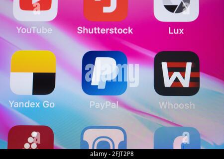 New York, USA - 26 April 2021: PayPal app logo on phone screen close-up top view, Illustrative Editorial. Stock Photo
