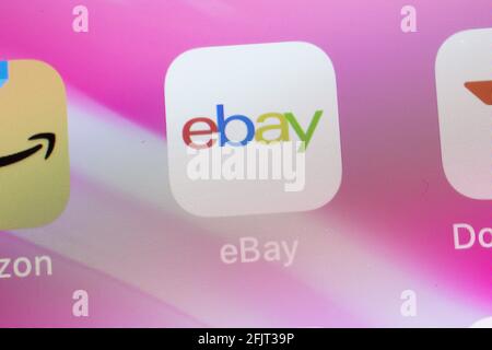 New York, USA - 26 April 2021: eBay app logo on phone screen close-up top view, Illustrative Editorial Stock Photo