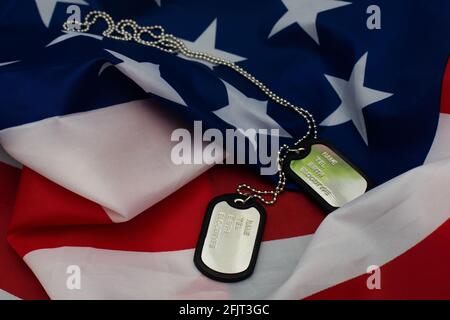 Soldier's token on American flag background Stock Photo