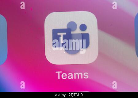 New York, USA - 26 April 2021: Microsoft Teams app macro logo on phone screen close-up top view, Illustrative Editorial Stock Photo
