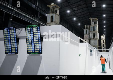 Milan, Italy. 26th April, 2021. Mass vaccination hub coordinated by ASST Nord Milano opens at “Pirelli HangarBicocca” where the monumental site-specific art installation ‘The Seven Heavenly Palaces 2004-2015' by artist Anselm Kiefer is on display. Credit: Piero Cruciatti/Alamy Live News Stock Photo