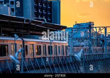 NAKANO, TOKYO, JAPAN - Feb 07, 2021: Sunset at Nakano Station in Tokyo, Japan, close to Shinjuku. Stock Photo