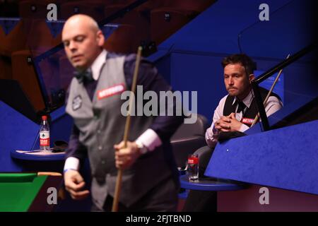 Jamie Jones of Wales watches on as Stuart Bingham of England is in action at the table during day 10 of the Betfred World Snooker Championships 2021 at The Crucible, Sheffield. Picture date: Monday April 26, 2021. Stock Photo