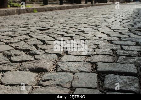 Stone paving roadway surface closeup as stone background Stock Photo