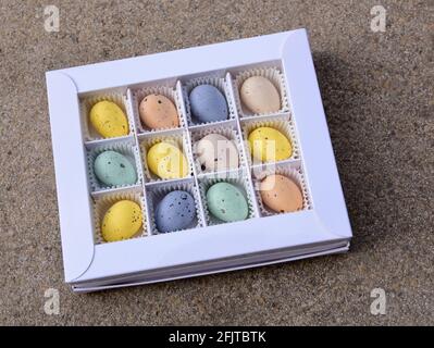 A packet of pastel coloured Easter eggs Stock Photo