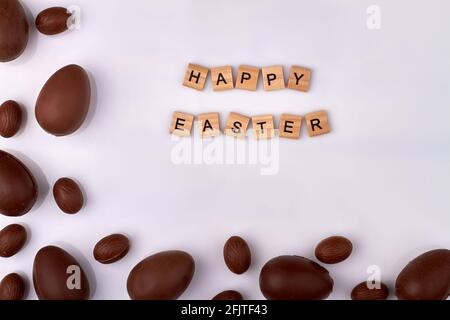 Happy easter wish made of wooden letters. Stock Photo