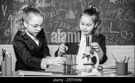 Gymnasium students with in depth study of natural sciences. Private school. Knowledge crossroads molecular biology and chemistry. School project Stock Photo