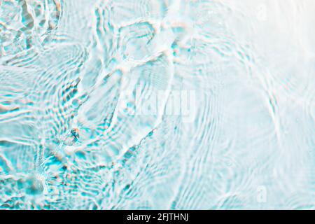 Light blue wavy abstract rippled water texture background Stock Photo