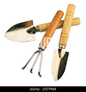 Gardening tools set isolated on white background. Two shovels and a rake for gardening. Herringbone for indoor plants and flowers. Tools with wooden handles. Small shovel. Gardener's too, accessory. Stock Photo