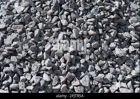 pile of rubble close up. Preparation for the construction of gray rubble. Stock Photo