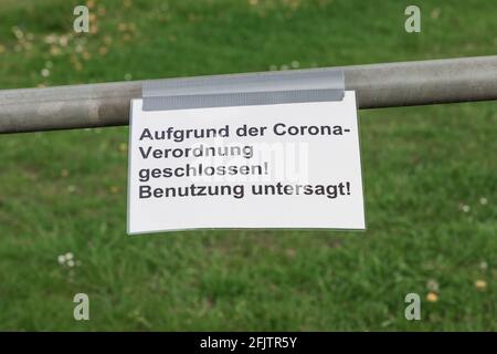 Corona virus quarantine lockdown prohibit entry community area. Covid-19 safety prevention. Closure prohibition sign. German text mean closed because Stock Photo