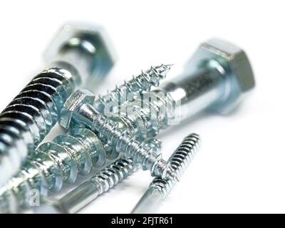 Wood screws, hexagon, close-up against white background Stock Photo