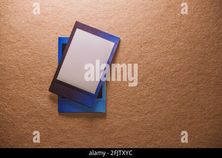 Two blank photo frame with on brown background as template for graphic design. Photo cards with space Stock Photo