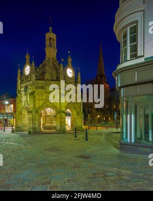 Chichester, UK - November 13, 2020:  Night views of Chichester cathedral and the market cross, West Sussex, UK Stock Photo