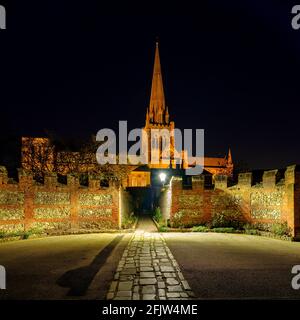 Chichester, UK - November 13, 2020:  Night views of Chichester cathedral and the market cross, West Sussex, UK Stock Photo