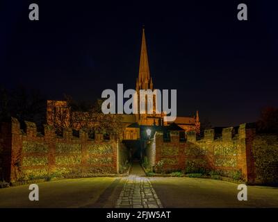 Chichester, UK - November 13, 2020:  Night views of Chichester cathedral and the market cross, West Sussex, UK Stock Photo