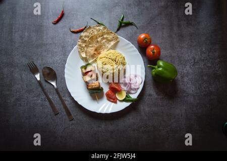 Top view of Indian lunch food ingredients with use of selective focus Stock Photo