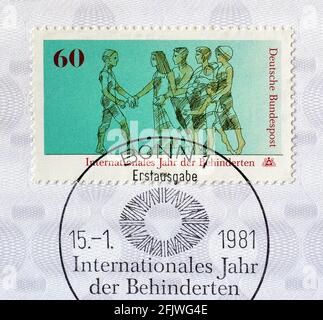 Cancelled Postage stamp printed by Germany, that shows Disabled and healthy people walking together, circa 1981.