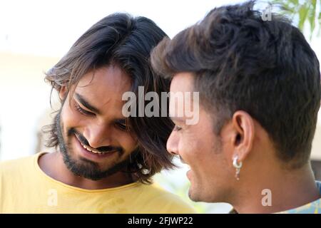Portrait of two young Indian males in the park Stock Photo