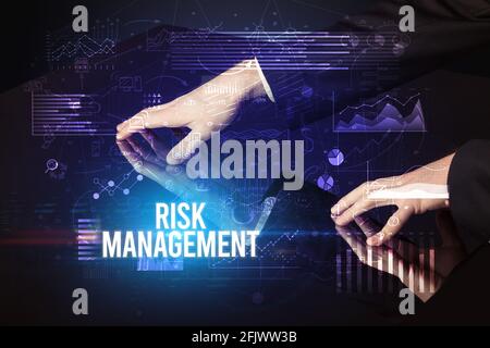 Businessman touching huge screen concept Stock Photo
