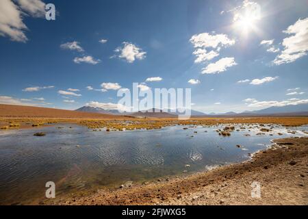 View from the Route B 245 at sunrise, a scenic road in the north of Chile. The road runs from San Pedro de Atacama to El Tatio Geysers, near the borde Stock Photo