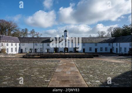 Castle Archdal, Northern Ireland- Mar 16,2021: The courtyard buildings that are all that is left of Castle Archdale House Stock Photo