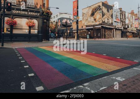 London, UK - August 12, 2020: Low angle view rainbow pedestrian crossing on High Street in Camden Town, London, a part of Pride month and in solidarit Stock Photo