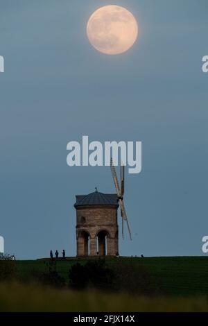 The moon rises behind Chesterton Windmill in Warwickshire, before the April super full moon on the 27th, which is traditionally known as the Pink Moon. Picture date: Monday April 26, 2021. Stock Photo