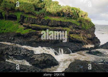 Dramatic series of waterfalls of Ohe'o Gulch cascading in Haleakala National Park, Maui, Hawaii Stock Photo