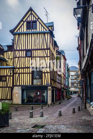 Rouen, France, Oct 2020, view of a medieval half-timbered house at Barthélemy square a cobblestoned place in the pedestrian centre of the city Stock Photo