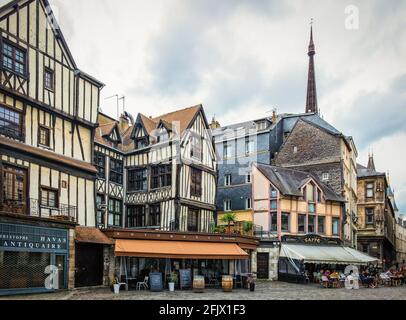 Rouen, France, Oct 2020, view of some medieval half-timbered houses at Barthélémy square a cobblestoned place in the pedestrian centre of the city Stock Photo
