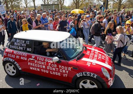 London, UK - 24 Apr 2021: A demonstrator uses his car ro send a message during a protest in central London calling for a lifting of all coronavirus restrictions.