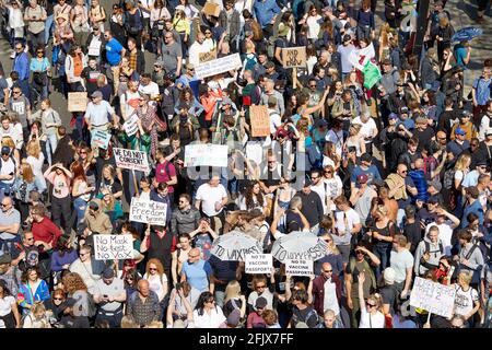 London, UK - 24 Apr 2021: Thousands of people marched in central London calling for a lifting of all coronavirus restrictions. Stock Photo