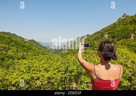 Female hiker taking picture at Seoraksan national park / Korea Stock Photo