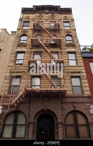 Facade of the late 19th-century multistory apartment building in the South Village neighborhood, at 15 Leroy Street, New York, NY, USA Stock Photo